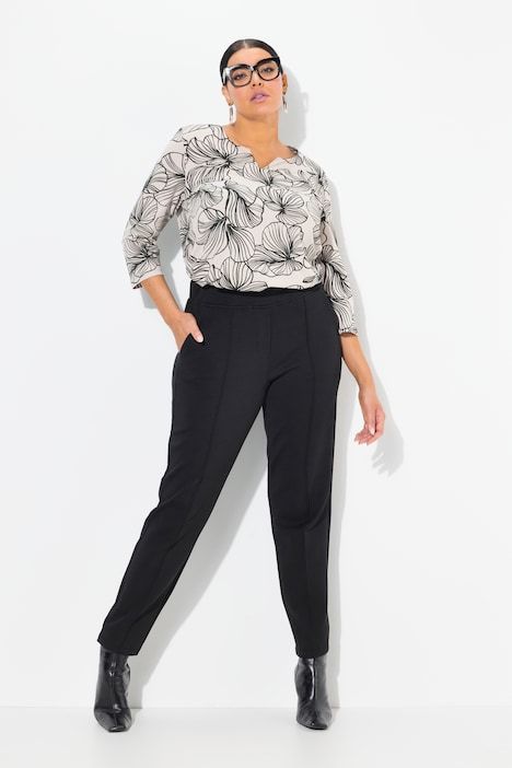 Pantalon point de Rome, jambe carotte. Taille élastique, plis fantaisie