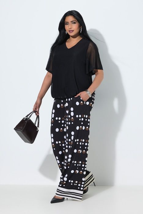 Pantalon au tombé fluide, motif à pois, jambe large et taille élastique