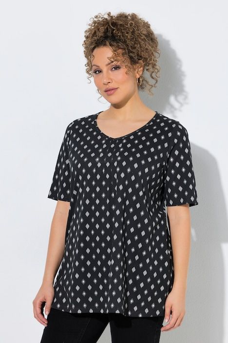 T-shirt avec passepoils, décolleté en V et manches courtes, coupe évasée
