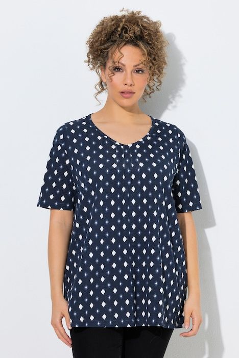 T-shirt avec passepoils, décolleté en V et manches courtes, coupe évasée