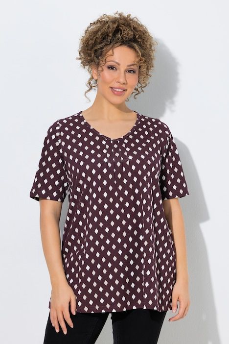 T-shirt avec passepoils, décolleté en V et manches courtes, coupe évasée