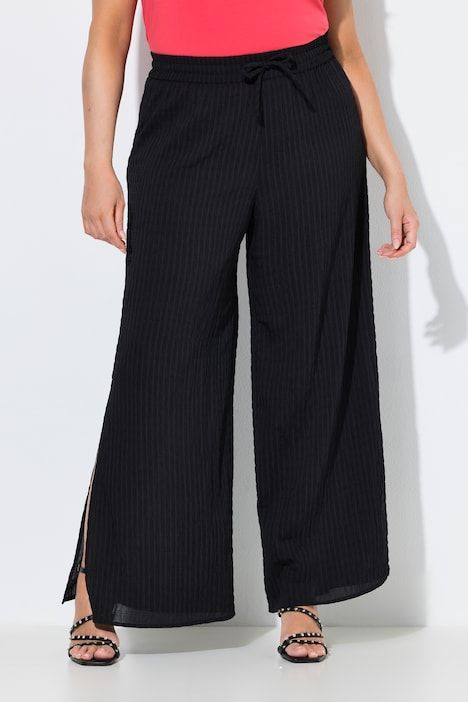 Pantalon, fentes à l’ourlet, jambe large et ceinture élastique