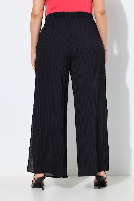 Pantalon, fentes à l’ourlet, jambe large et ceinture élastique