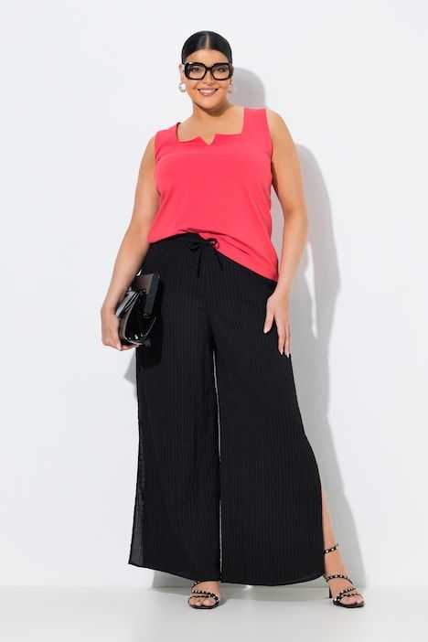 Pantalon, fentes à l’ourlet, jambe large et ceinture élastique