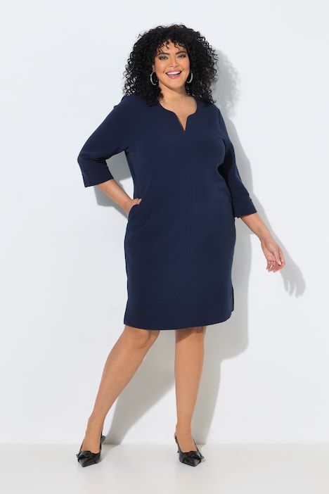 Robe texturée, col tunisien et manches 3/4