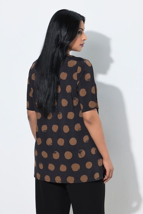 T-shirt au tombé fluide, motif à pois, décolleté en V et manches courtes, coupe évasée