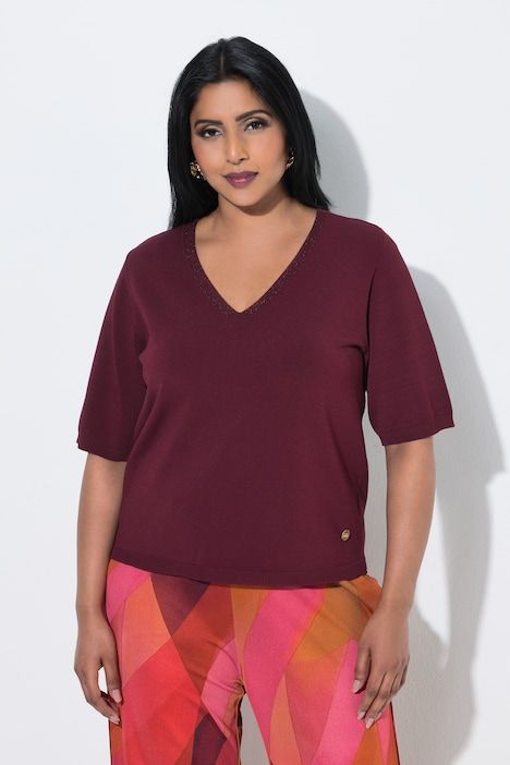 Pull manches courtes, décolleté en V avec liseré scintillant, base élastique
